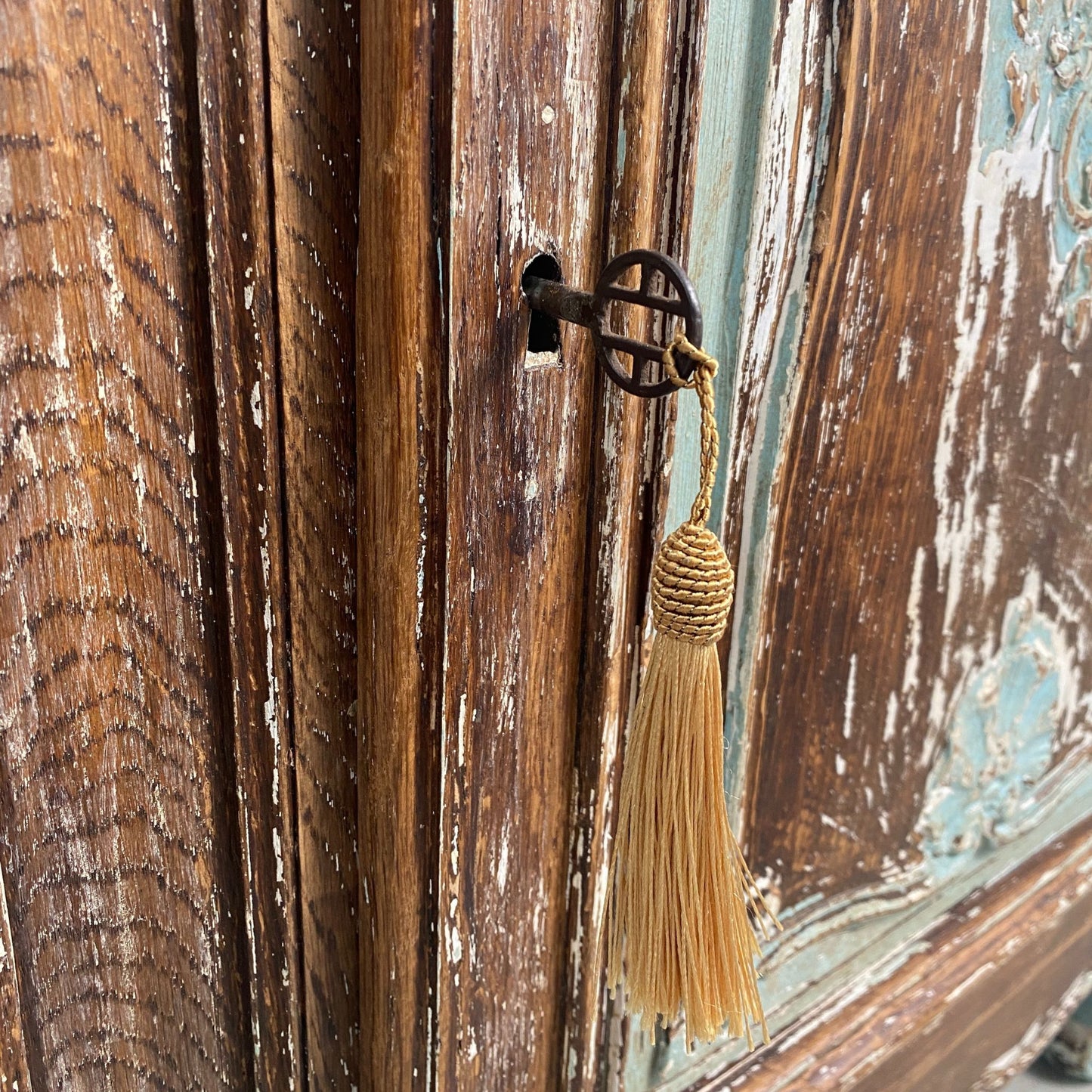 Close up of the original key & lock of a Stripped Oak Dresser with an aged patina in the style of a French Library