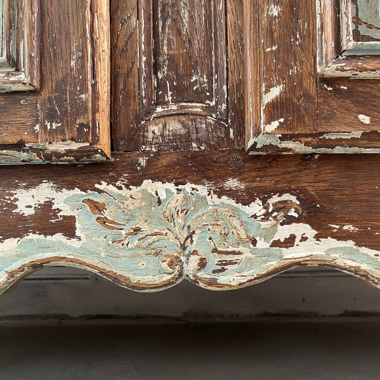 Close Up of the lower section paintwork from a Stripped Oak Dresser with an aged patina in the style of a French Library