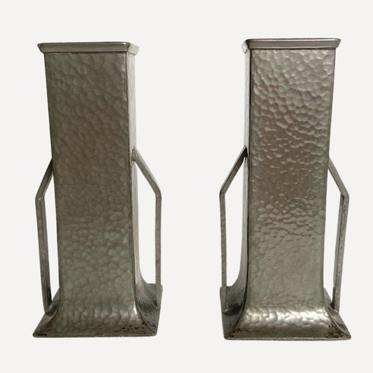 Pair of art deco vases, hand beaten pewter, makers stamp on the base, 20cm tall, 9cm wide, each with arm like handles on either side
